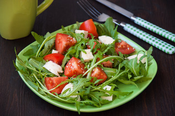 fresh salad with mozzarella, ruccola and tomatoes