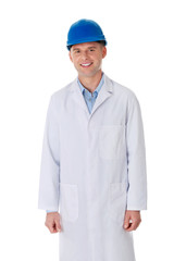 Man in a lab coat and helmet