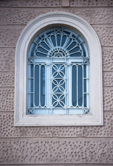 Fototapeta na wymiar Windows with iron ornamental