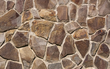 large cracks in the old stone wall