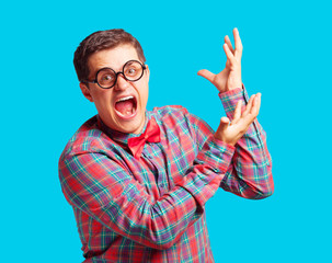 Naklejka premium Nerdl man in shirt on blue background.