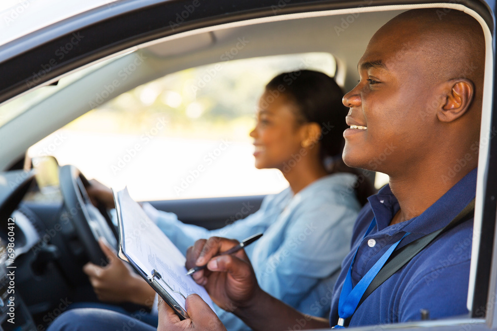 Poster african american driving instructor inside a car