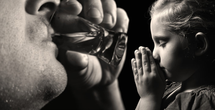 Child prays that father stopped drinking alcohol.