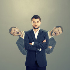 men behind confident businessman