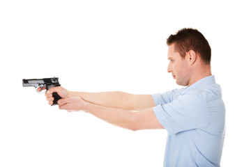 Fototapeta na wymiar Man with gun