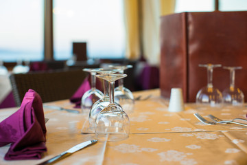 Served table set at restaraunt in the evening