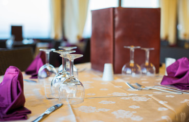 Close-up of glass in a restaurant in the evening
