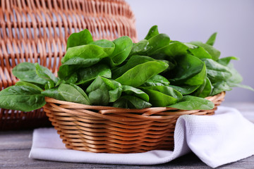 Fresh sorrel in round wicker basket