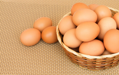 egg in basket wicker on white background
