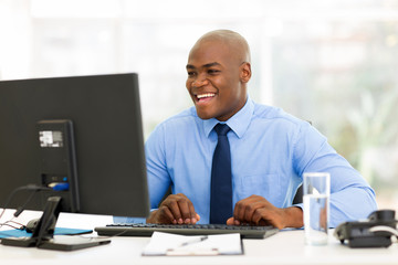 Fototapeta na wymiar african american businessman working on computer