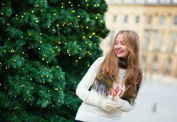 Cheerful girl on a Parisian street