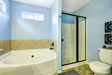 Blue bathroom with tile trim