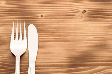 Knife and fork set on a wooden vintage table