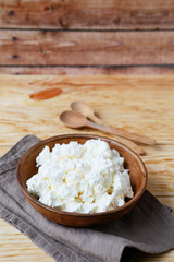 fat cottage cheese in a bowl rustic