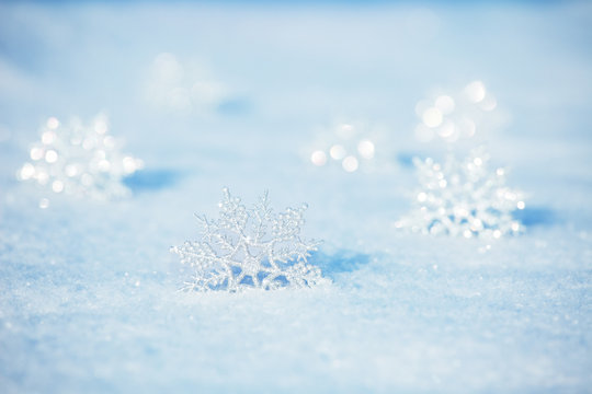 Snowflakes on snow
