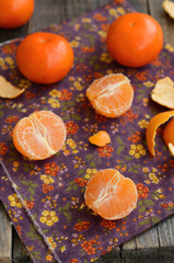 Fototapeta na wymiar Ripe and juicy tangerine cloves