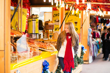 Happy girl on a Parisian Christmas market