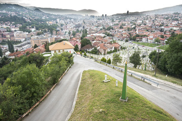 Sarajevo Cityscape. War graveyard in city centre at dusk