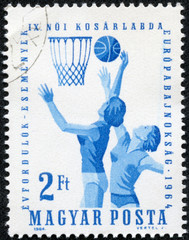 stamp printed in Hungary shows image of netball players