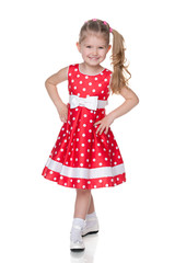 Little girl in the polka dot dress