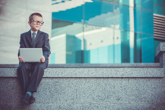 Kid Businessman With Laptop