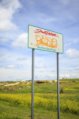 Obraz premium Welcoming sign to South Dakota