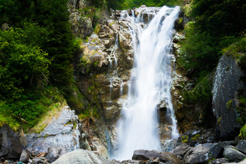 Fototapeta na wymiar Alpine waterfall
