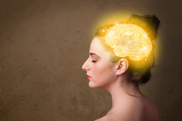 Young girl thinking with glowing brain illustration