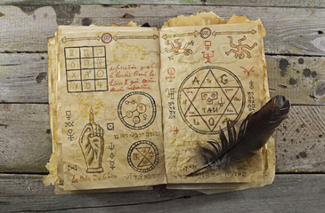 Fototapeta premium Magic book on wooden table 1