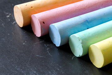 Fototapeta premium Colorful chalk on blackboard