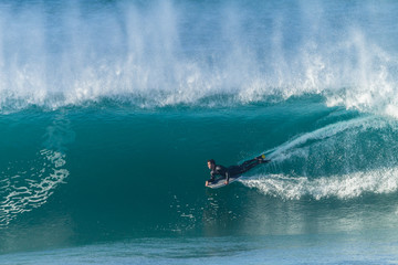 Fototapeta premium Surfing Body-Boarder Hollow Wave