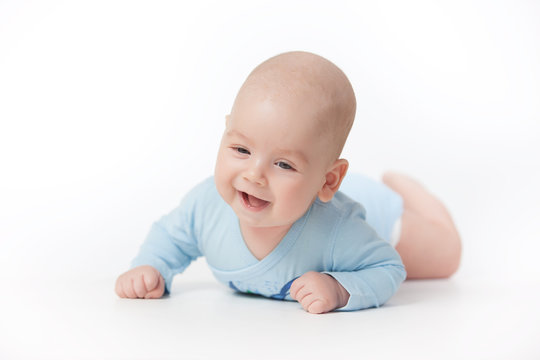 Smiling happy Baby Isolated on White