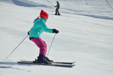 Fototapeta na wymiar Youth skier on the piste