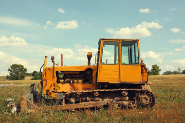 Vintage tractor in field