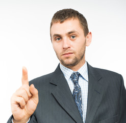 Young businessman point the index finger
