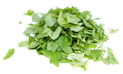 Portion of fresh Lovage on white