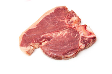 T-bone steak isolated on a white studio background.