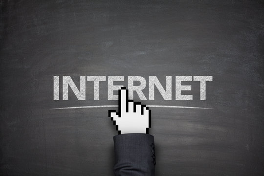 Internet concept on black blackboard