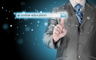 Online education written in search bar on virtual screen.