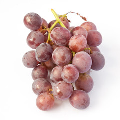 Fresh red grape isolated on white