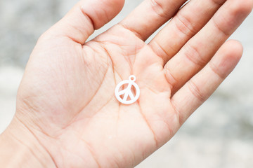 Peace icon in hand