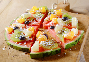 Tasty juicy tropical fruit watermelon pizza