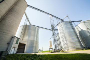 Fototapeta premium Silver, shiny agricultural silos