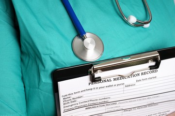 Doctor with medical chart and stethoscope