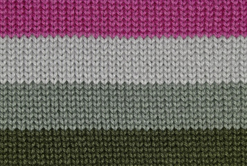 Fototapeta premium Knit woolen texture. Fabric striped background