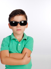 Serious child with sunglasses.