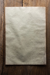 paper on wooden background
