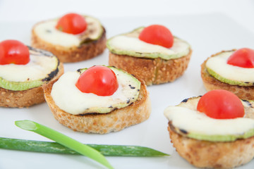 bruschetta (Italian Toasted Bread ) zucchini, tomato,mozzarella