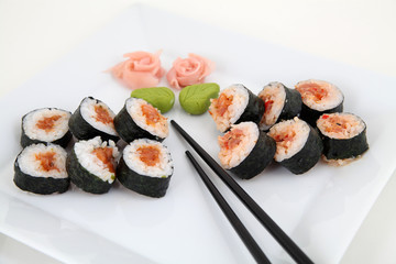 sushi set on white plate. Traditional japanese sushi rolls