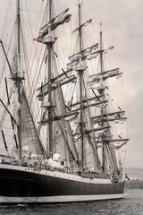 Old ship with white sales in black and white © dechevm